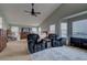 Main bedroom with sitting area and relaxing armchairs at 1035 Cryolite Pl, Castle Rock, CO 80108