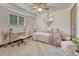 Cozy bedroom with a stylish desk area and comfortable bed setup at 1821 E Kettle Ave, Centennial, CO 80122