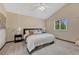 Cozy bedroom features vaulted ceilings, a ceiling fan, and large windows at 1821 E Kettle Ave, Centennial, CO 80122