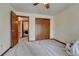Bright bedroom with closet space and a view of the laundry area at 1821 E Kettle Ave, Centennial, CO 80122