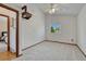 Bright bedroom offers plush carpeting and a view to the yard at 1821 E Kettle Ave, Centennial, CO 80122