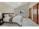 Comfortable bedroom boasts plush carpeting, natural light, and ample closet space at 1821 E Kettle Ave, Centennial, CO 80122