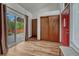 Bright entryway with hardwood floors and direct access to the backyard at 1821 E Kettle Ave, Centennial, CO 80122