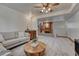 Spacious living room featuring a wet bar, fireplace, and comfortable seating area at 1821 E Kettle Ave, Centennial, CO 80122