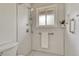 Modern walk-in shower features tiled walls, glass door, and sleek fixtures at 1821 E Kettle Ave, Centennial, CO 80122