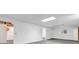 Spacious basement featuring neutral walls and carpet, bright lighting and open layout, ready for customization at 8705 W 86Th Dr, Arvada, CO 80005