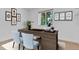 Home office space with neutral decor, hardwood floors, and natural light at 8705 W 86Th Dr, Arvada, CO 80005