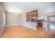 Dining room with stylish chandelier, hardwood floors, and adjacent kitchen view at 4225 W 30Th Ave, Denver, CO 80212