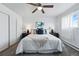 Bedroom features a comfortable bed, soft lighting, and neutral decor at 2595 S Sheridan Blvd # 20, Denver, CO 80227