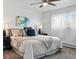 Bedroom features a comfortable bed, soft lighting, and neutral decor at 2595 S Sheridan Blvd # 20, Denver, CO 80227