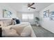 Bedroom features a comfortable bed, soft lighting, and neutral decor at 2595 S Sheridan Blvd # 20, Denver, CO 80227
