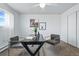 Bright bedroom featuring modern decor, carpet, and ample natural light at 2595 S Sheridan Blvd # 20, Denver, CO 80227