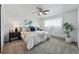 Bedroom features a comfortable bed, soft lighting, and neutral decor at 2595 S Sheridan Blvd # 20, Denver, CO 80227