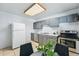 View of kitchen showcasing appliances, countertops, and cabinets at 2595 S Sheridan Blvd # 20, Denver, CO 80227