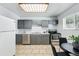 Eat-in kitchen features tile floors, lots of light and stainless steel appliances at 2595 S Sheridan Blvd # 20, Denver, CO 80227