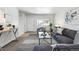 Inviting living room with cozy decor, natural light, and an open layout design at 2595 S Sheridan Blvd # 20, Denver, CO 80227