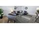 Open living room features modern decor, and a comfortable couch perfect for relaxation at 2595 S Sheridan Blvd # 20, Denver, CO 80227
