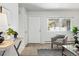 A bright living room provides an open layout with stylish decor and lots of light at 2595 S Sheridan Blvd # 20, Denver, CO 80227