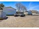 Parking lot with a variety of vehicles and numbered parking spaces at 2595 S Sheridan Blvd # 20, Denver, CO 80227