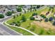 Aerial shot captures a neighborhood park with play equipment, providing a community space for recreation and leisure at 4312 Windmill Dr, Brighton, CO 80601