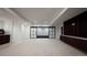 Stylish basement area with wet bar and media console, ideal for relaxation at 3112 Braun Ct, Golden, CO 80401