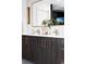 Bathroom vanity showcasing dual sinks and contemporary style at 3112 Braun Ct, Golden, CO 80401