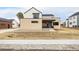 Contemporary two-story home with clean lines, brick accents, and modern curb appeal at 3112 Braun Ct, Golden, CO 80401