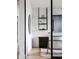 Modern hallway featuring clean lines, stylish shelving, and elegant finishes at 3112 Braun Ct, Golden, CO 80401