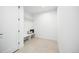 Convenient mudroom featuring bench, storage hooks, and tile flooring at 3112 Braun Ct, Golden, CO 80401