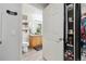 Well-lit bathroom featuring modern fixtures and a closet in the background at 23376 E 5Th Pl # 201, Aurora, CO 80018
