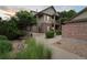 Inviting exterior of a two-story home with a combination of brick and siding, a welcoming entry, and manicured landscaping at 23376 E 5Th Pl # 201, Aurora, CO 80018