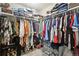 Spacious walk-in closet with ample shelving and hanging space for clothes and accessories at 23376 E 5Th Pl # 201, Aurora, CO 80018