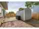 Spacious backyard with patio, garden shed, and wood fence at 12556 Elm St, Thornton, CO 80241