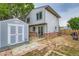 Backyard featuring the home's exterior, patio, shed and wooden fence at 12556 Elm St, Thornton, CO 80241