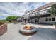 Backyard featuring a built-in fire pit and a multi-tiered deck perfect for outdoor entertaining at 9053 Clydesdale Rd, Castle Rock, CO 80108