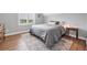 Bedroom with plush carpet, natural light, and soft neutral colors at 9053 Clydesdale Rd, Castle Rock, CO 80108