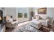 Inviting living room with plush seating, a fireplace, and French doors to the deck at 9053 Clydesdale Rd, Castle Rock, CO 80108