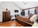 Bright bedroom with king-size bed, fireplace, and large windows at 961 S Evanston Cir, Aurora, CO 80012