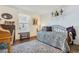 Bedroom with daybed, wooden floors, and window at 961 S Evanston Cir, Aurora, CO 80012