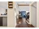 Hallway view from kitchen to living room at 961 S Evanston Cir, Aurora, CO 80012