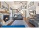 Spacious living room features a fireplace and hardwood floors at 961 S Evanston Cir, Aurora, CO 80012