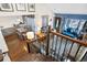 View from stairs showcasing the living and dining areas at 961 S Evanston Cir, Aurora, CO 80012