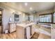 Luxurious bathroom with double vanities, a separate glass-enclosed shower, and a soaking tub by the window at 8576 Niwot Meadow Farm Rd, Niwot, CO 80503