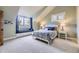Bright and cozy bedroom featuring a window seat, neutral walls, and soft carpeting, perfect for relaxation at 8576 Niwot Meadow Farm Rd, Niwot, CO 80503