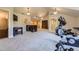 Versatile bonus room with high ceilings, carpeted floors, and ample space for various activities or entertainment at 8576 Niwot Meadow Farm Rd, Niwot, CO 80503