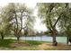 Well-maintained tennis courts surrounded by trees, near the community at 175 S Jasmine St, Denver, CO 80224