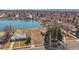 Aerial view of lakefront properties featuring private docks and spacious lots in a quiet neighborhood at 4760 W Evans Ave, Denver, CO 80219