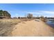 Sandy beachfront property with water access perfect for enjoying outdoor activities and lake living lifestyle at 4760 W Evans Ave, Denver, CO 80219