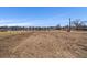 Spacious lot with direct access to the lake, offering scenic views and development possibilities at 4760 W Evans Ave, Denver, CO 80219