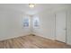 Bright bedroom with hardwood floors and new paint at 4145 Otis St, Wheat Ridge, CO 80033